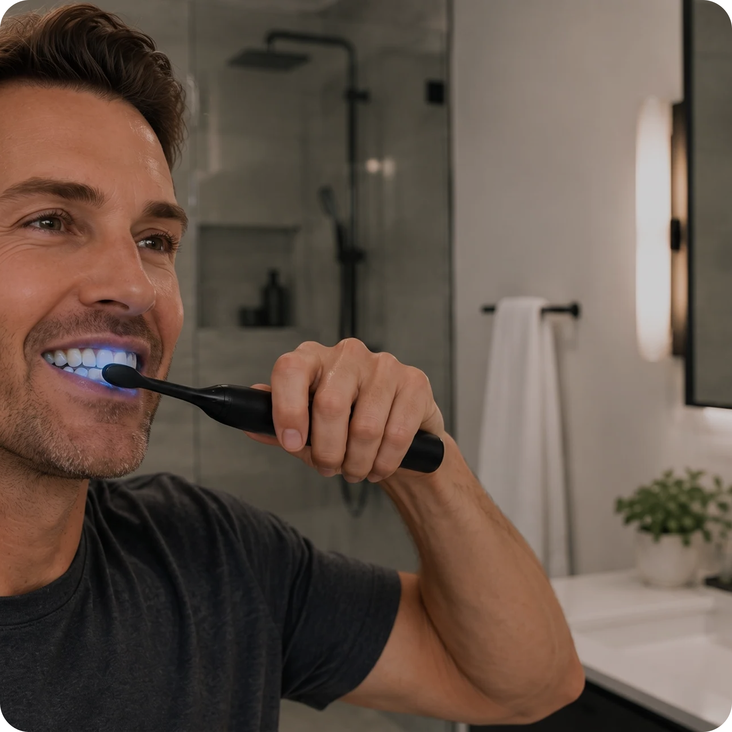 Man brushing with the blue light head