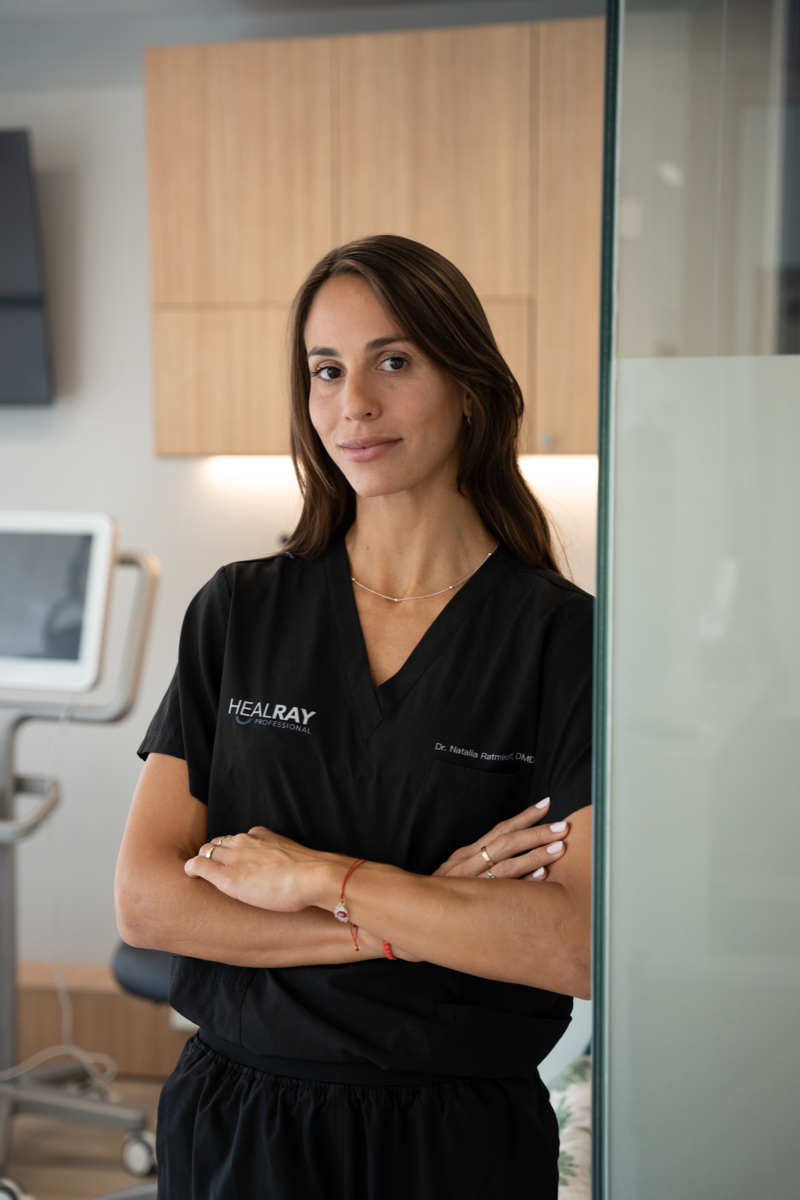 Dr. Natalia Ratmiroff in dental scrubs